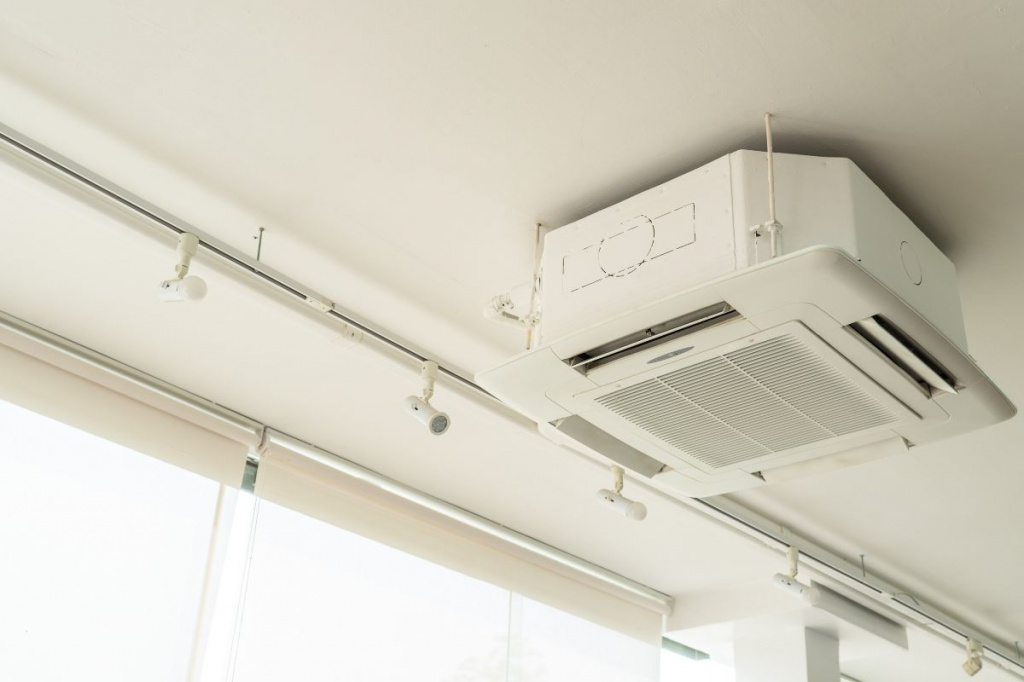 picture-of-cassette-type-air-conditioner-or-cooling-system-on-the-ceiling-in-the-house.-business-and-interior-design-concept.jpg